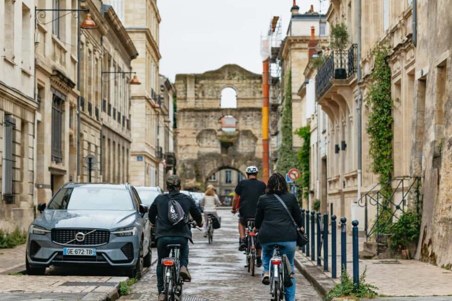 Bordeaux: Historic Center & Chartrons District Bike Tour - Pont de Pierre crossing: one river, two Bordeauxs