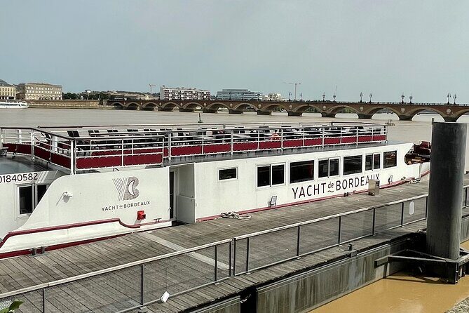 Prestige Commented Cruise glass of wine and Canelé in Bordeaux - Why This 90-Minute Garonne Cruise Works for First-Time Bordeaux